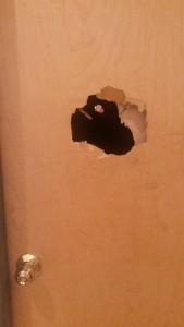 broken punched door